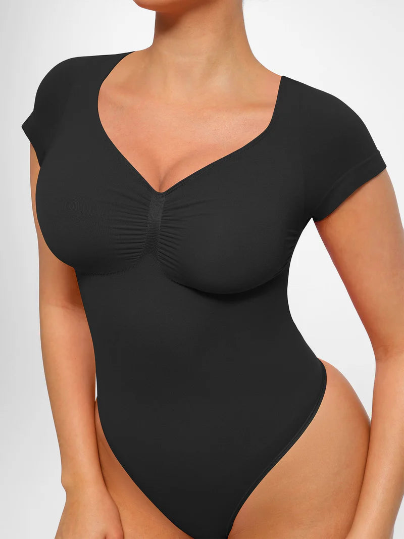 Body modelujące z rękawkiem i stringami
