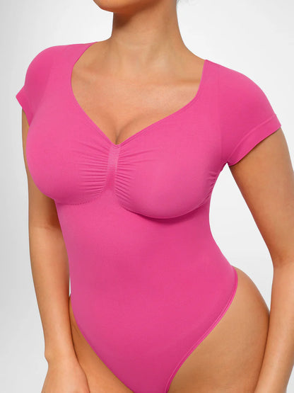 Body modelujące z rękawkiem i stringami