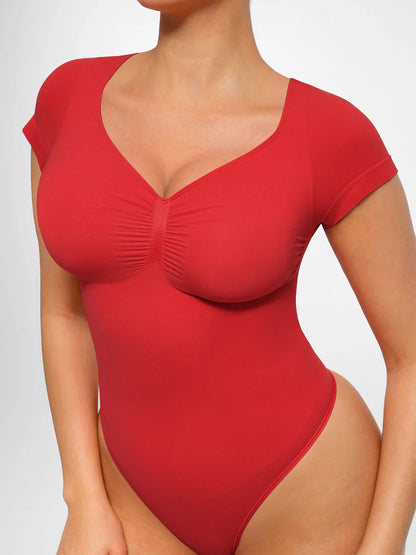 Body modelujące z rękawkiem i stringami