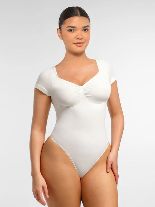 Body modelujące z rękawkiem i stringami