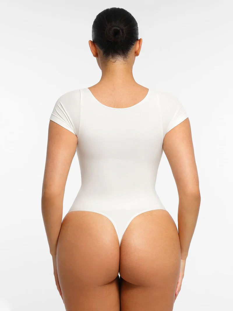 Body modelujące z rękawkiem i stringami