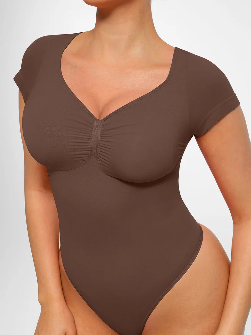 Body modelujące z rękawkiem i stringami