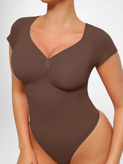 Body modelujące z rękawkiem i stringami